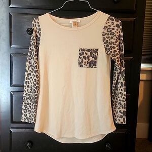 Leopard  and cream blouse